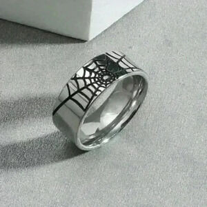 New Spider Web Band Ring: Embrace your edgy side with this bold band ring